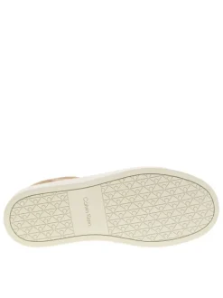 Tennis en cuir beiges à talon plat avec des lacets et logo embossé