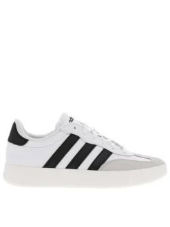 Tennis en cuir blanches avec semelle à talon plat et fermeture à lacets