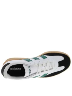 Tennis en cuir blanches avec semelle à talon plat et à lacets