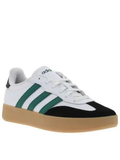 Tennis en cuir blanches avec semelle à talon plat et à lacets