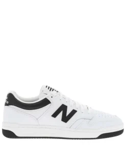 Tennis en cuir blanches avec talon plat et logos de la marque