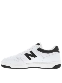Tennis en cuir blanches avec talon plat et logos de la marque