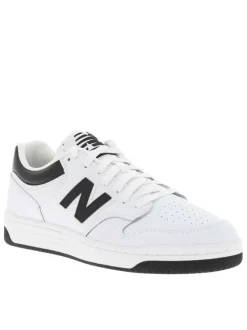 Tennis en cuir blanches avec talon plat et logos de la marque