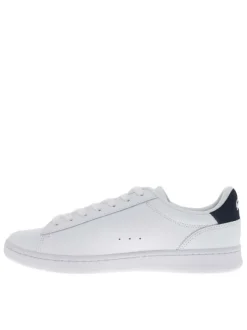 Tennis en cuir blanches et bleues avec un talon plat et des lacets