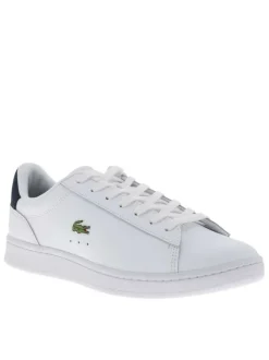 Tennis en cuir blanches et bleues avec un talon plat et des lacets