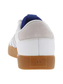 Tennis en cuir blanches et bleues à semelle marron avec lacets ronds tressés