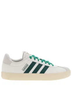 Tennis en cuir blanches et vertes à semelle écrue avec lacets plats verts