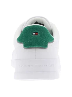 Tennis en cuir blanches et vertes à talon plat avec des lacets