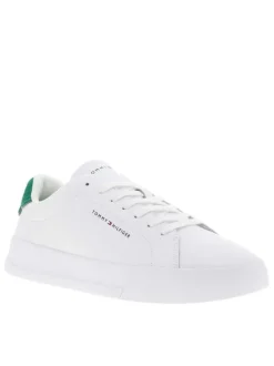 Tennis en cuir blanches et vertes à talon plat avec des lacets