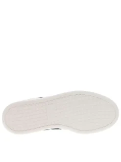 Tennis en cuir blanches à semelle écrue avec logo bleu et rouge