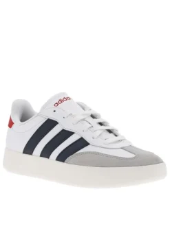Tennis en cuir blanches à semelle écrue avec logo bleu et rouge