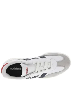 Tennis en cuir blanches à semelle écrue avec logo bleu et rouge