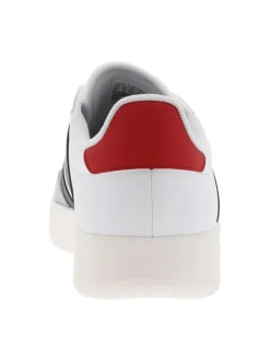Tennis en cuir blanches à semelle écrue avec logo bleu et rouge