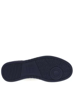 Tennis en cuir blanc à talon plat et à lacets plats blancs avec trous d'aération