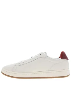 Tennis en cuir ivoire à talon plat avec des lacets et un revêtement en grains