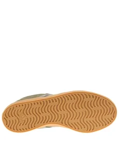 Tennis en cuir kaki avec semelle à talon plat et lacets ton sur ton