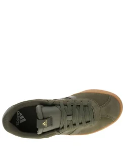Tennis en cuir kaki avec semelle à talon plat et lacets ton sur ton
