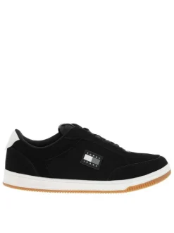 Tennis en cuir noires avec semelle à talon plat et lacets contrastés