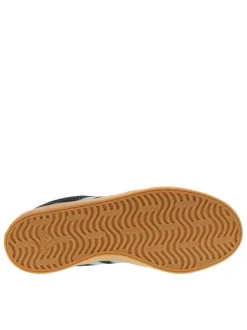 Tennis en cuir noires avec un talon plat et fermeture à lacets