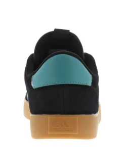 Tennis en cuir noires avec un talon plat et fermeture à lacets