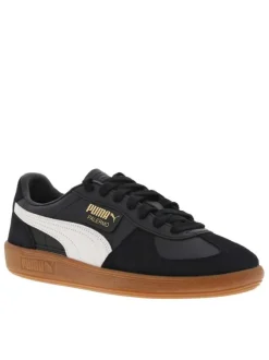Tennis en cuir noires à semelle marron avec lacets plats et logo blanc et doré