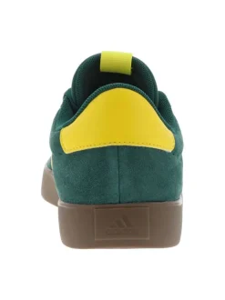 Tennis en cuir vertes avec un talon plat et fermeture à lacets