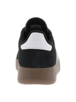 Tennis noires en croûte de cuir avec semelle à talon plat et à lacets