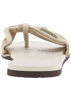 Tongs antidérapantes à entre-doigts liant la sangle vert pastel du coup-de-pied