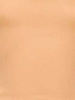 Top en coton biologique orange uni pourvu d'une coupe asymétrique
