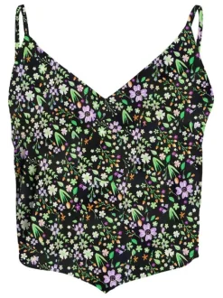 Top asymétrique noir fleuri avec une coupe cropped et un col v