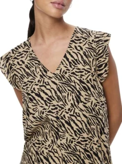 Top beige avec un imprimé abstrait coupe droite col v et un col v
