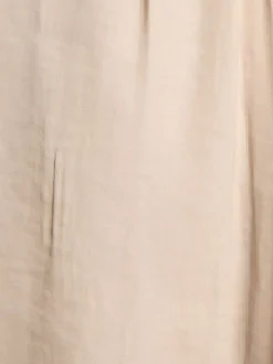 Top beige clair uni chic pourvu d'une coupe droite et d'un col en V
