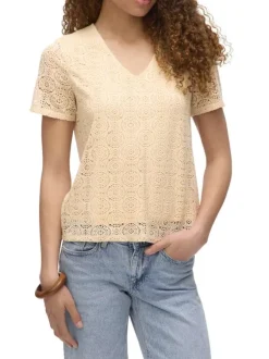 Top beige en guipure pourvu d'un col v et de manches courtes