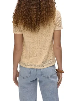 Top beige en guipure pourvu d'un col v et de manches courtes