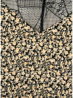 Top beige liberty coupe régular avec un col v et des manches à bretelles fines