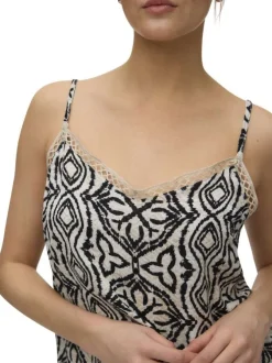 Top beige à motifs avec une coupe droite sans manches avec des bretelles