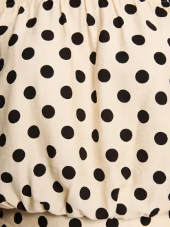 Top beige à motifs pourvu d'une coupe droite et d'un col bateau