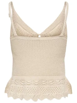 Top beige uni sans manche pourvu d'une coupe évasée et d'un col v