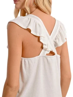 Top blanc uni avec une coupe droite un col v et des manches courtes
