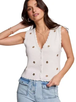 Top blanc uni avec une coupe droite un col v et sans manches