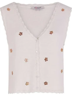 Top blanc uni avec une coupe droite un col v et sans manches