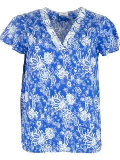 Top bleu imprimé de fleurs avec une coupe droite et des manches courtes