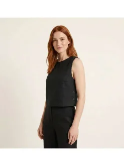 Top en coton noir uni avec un col rond et une fermeture boutonnée