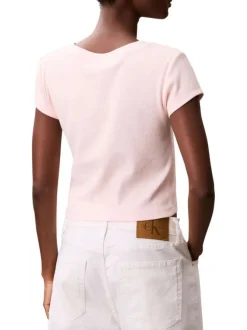 Top en coton rose uni à col v et à coupe courte avec un patch à la poitrine