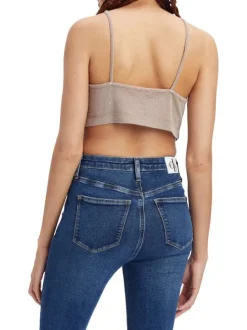 Top à fines bretelles en coton beige uni plus long à l'avant