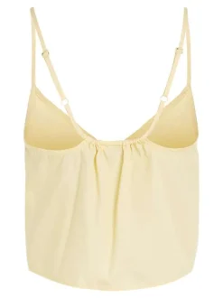 Top à fines bretelles en coton biologique jaune uni à coupe cropped et col v