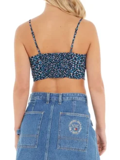 Top à fines bretelles marine fleuri avec une coupe cropped et un col v