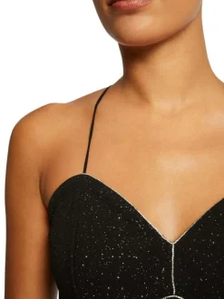 Top à fines bretelles noir pailleté à coupe moulant et un col coeur