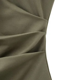 Top kaki uni sans manche pourvu d'une coupe ajustée et d'un col rond