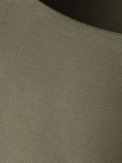 Top kaki uni sans manche pourvu d'une coupe ajustée et d'un col rond